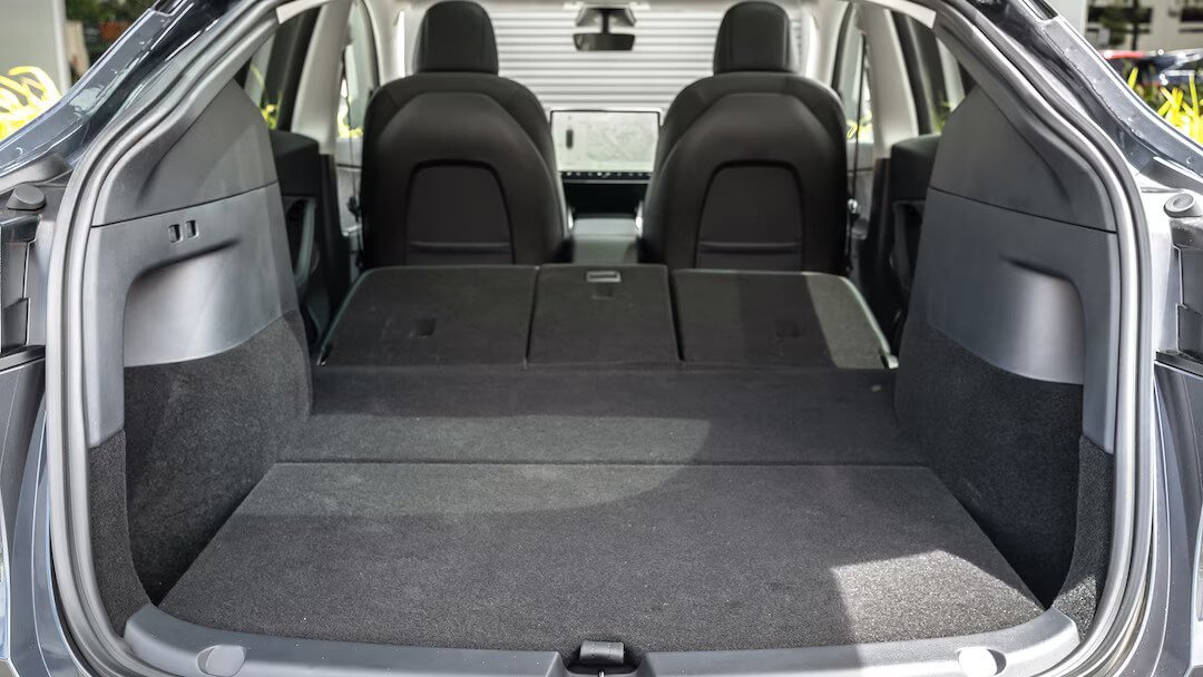 Tesla Model Y Performance (2020-2025) folded trunk photo, boot, expanded, folded seats, maximum volume, max cargo, max capacity, max storage