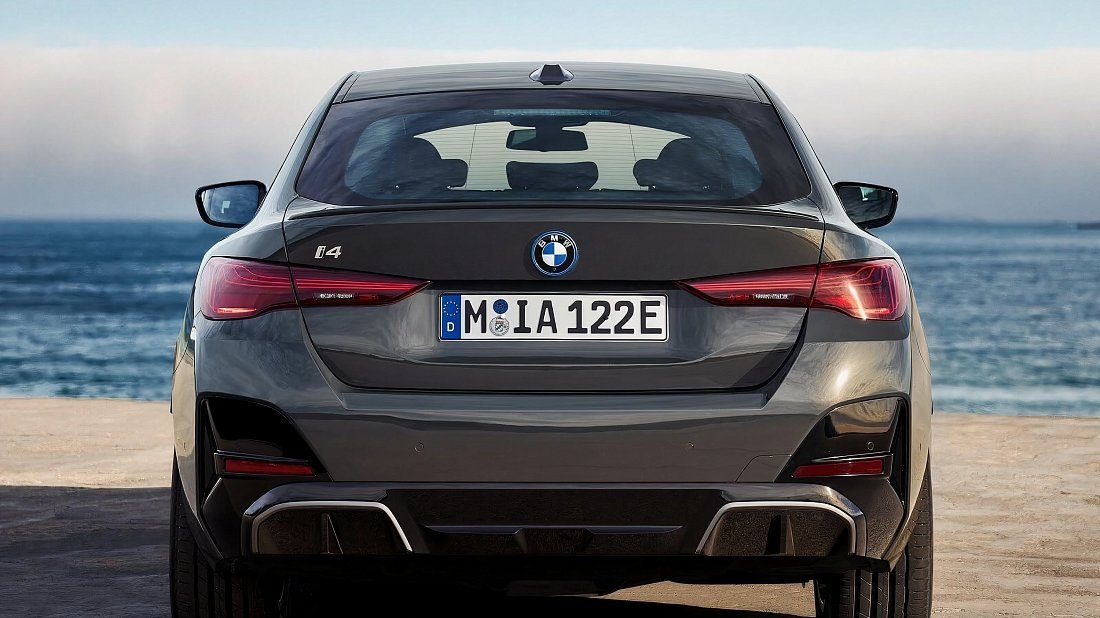 BMW i4 xDrive40 (2024-…) rear view, taillights, trunk, spoiler, badge, bumper, exterior