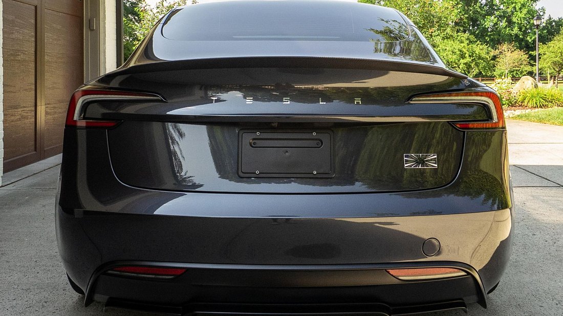 Tesla Model 3 Performance (2024-…) rear view photo, taillights, trunk, spoiler, badge, bumper, exterior