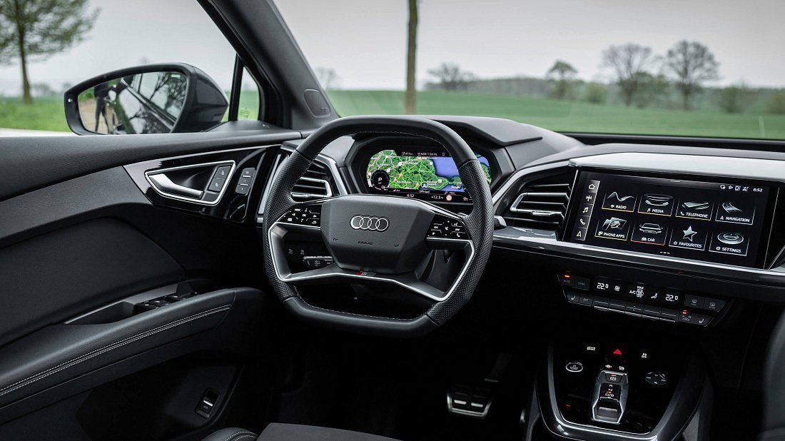 Audi Q4 Sportback e-tron 35 (2024-...) interior, front seat, driver seat, dashboard, steering wheel, infotainment, cockpit