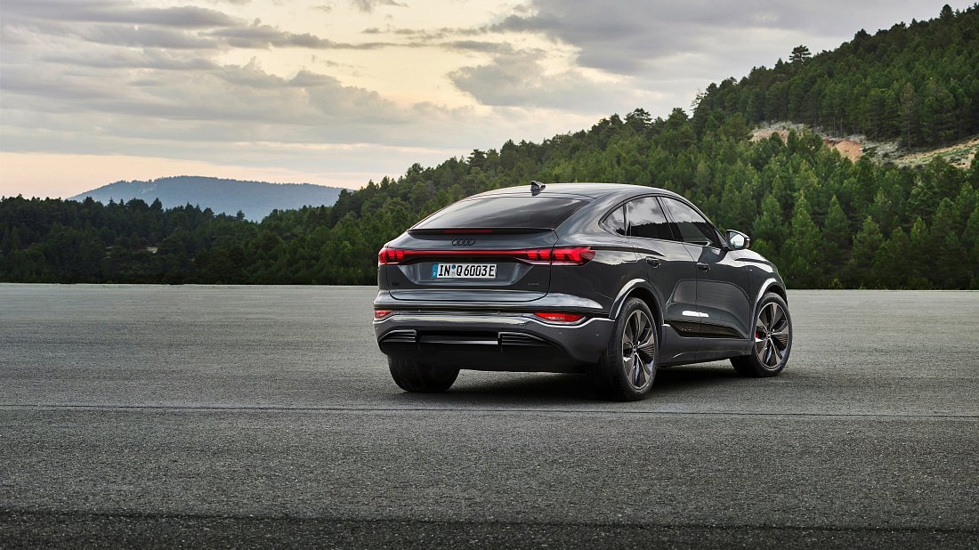 Audi Q6 Sportback e-tron quattro (2025-…) rear quarter, three-quarter view, diagonal, exterior