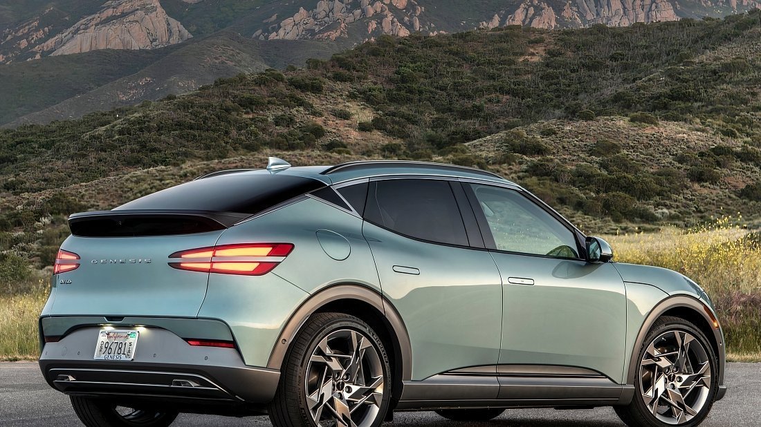 Genesis GV60 Advanced AWD (2022-…) rear quarter photo, three-quarter view, diagonal, exterior