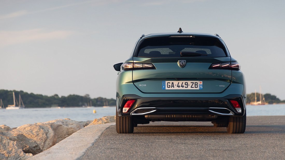 Peugeot e-308 Station Wagon (2023-…) rear view, taillights, trunk, spoiler, badge, bumper, exterior
