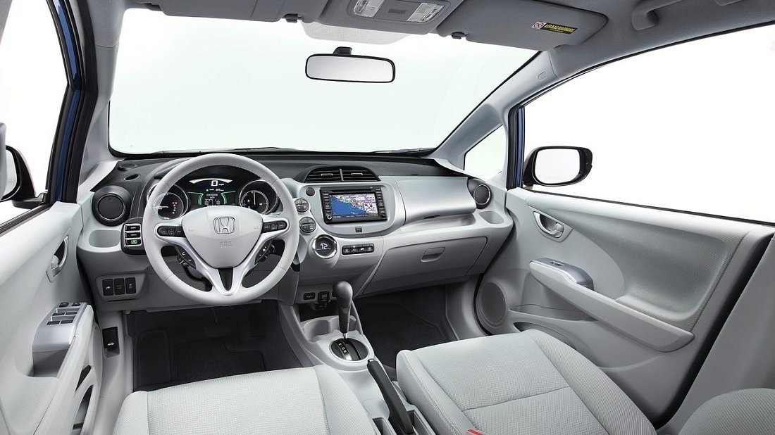 Honda Fit EV (2013-2015) interior photo, front seat, driver seat, dashboard, steering wheel, infotainment, cockpit