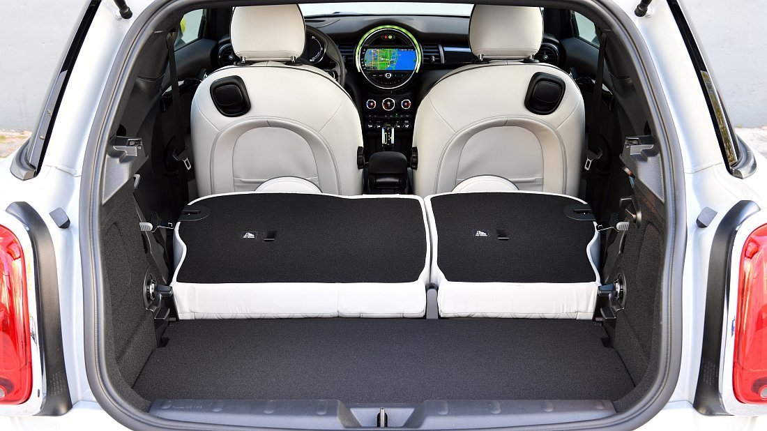 Mini Cooper SE (2021-2024) folded trunk photo, boot, expanded, folded seats, maximum volume, max cargo, max capacity, max storage