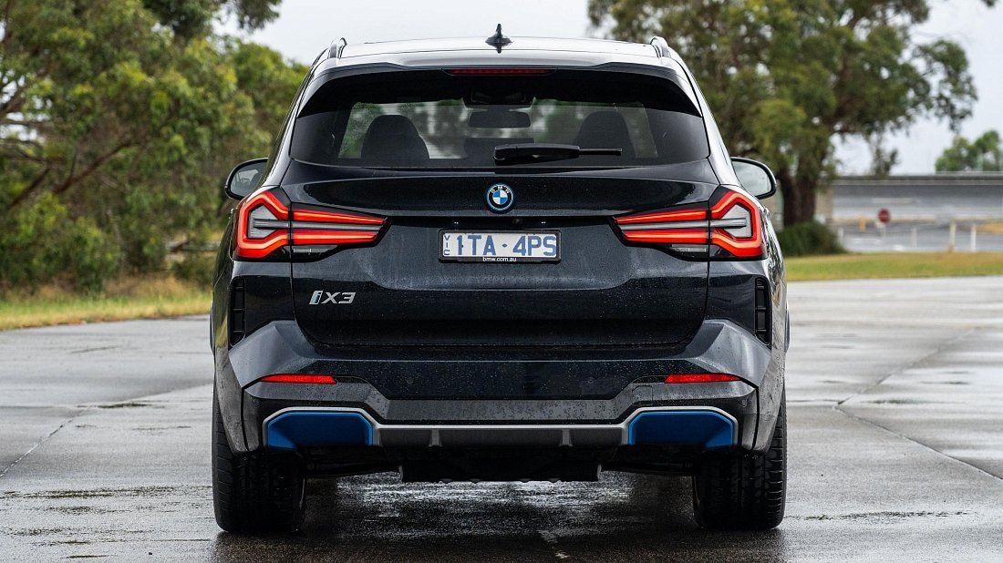 BMW iX3 Gen 2 (2021-…) rear view, taillights, trunk, spoiler, badge, bumper, exterior