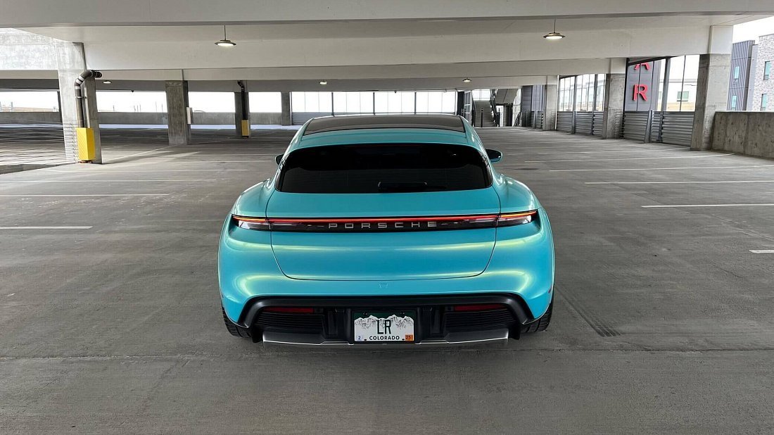 Porsche Taycan Turbo Sport Turismo (2022-2024) rear view, taillights, trunk, spoiler, badge, bumper, exterior