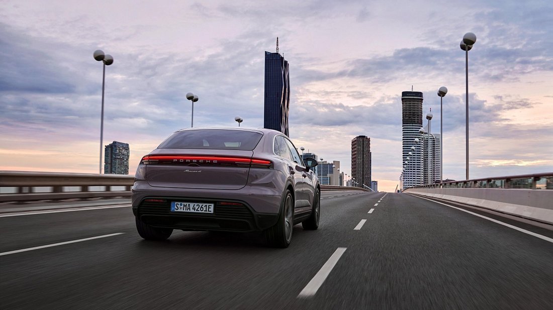 Porsche Macan 4 Electric (2024-…) rear view photo, taillights, trunk, spoiler, badge, bumper, exterior