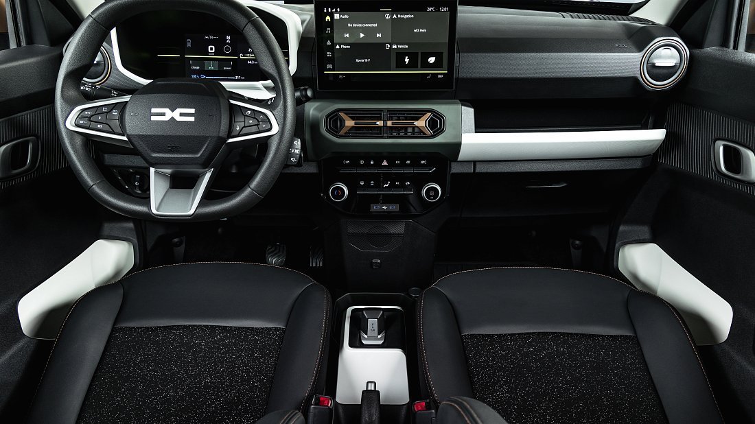 Dacia Spring Electric 45 (2024-…) interior, front seat, driver seat, dashboard, steering wheel, infotainment, cockpit