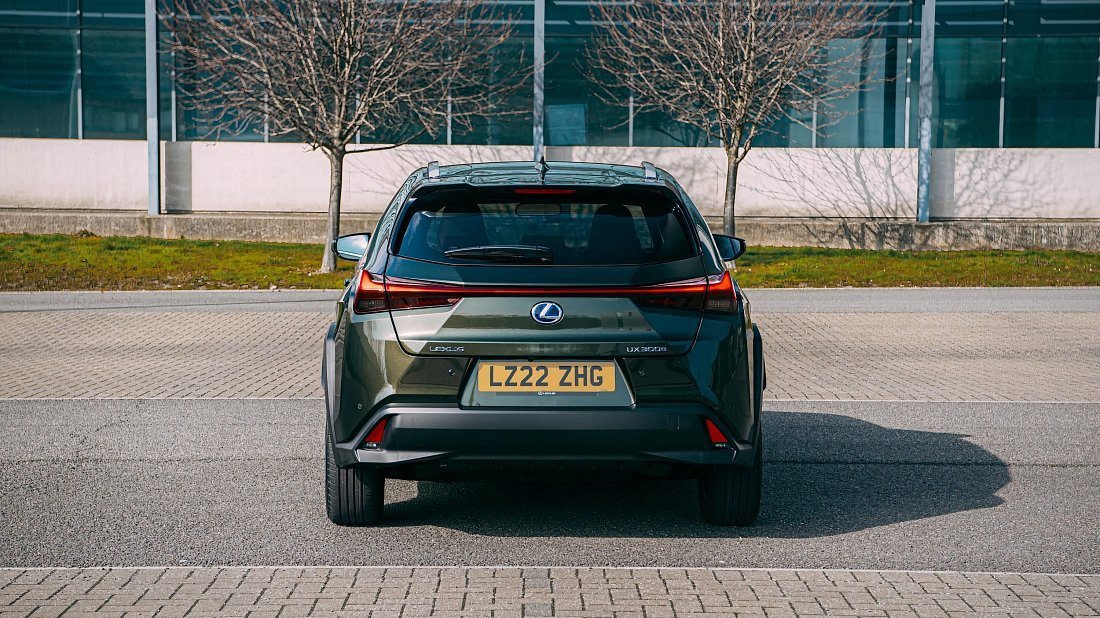 Lexus UX 300e (2023-…) rear view photo, taillights, trunk, spoiler, badge, bumper, exterior