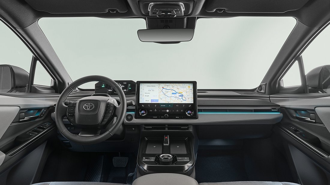 Toyota C-HR+ 77 kWh FWD (2025-…) interior, front seat, driver seat, dashboard, steering wheel, infotainment, cockpit