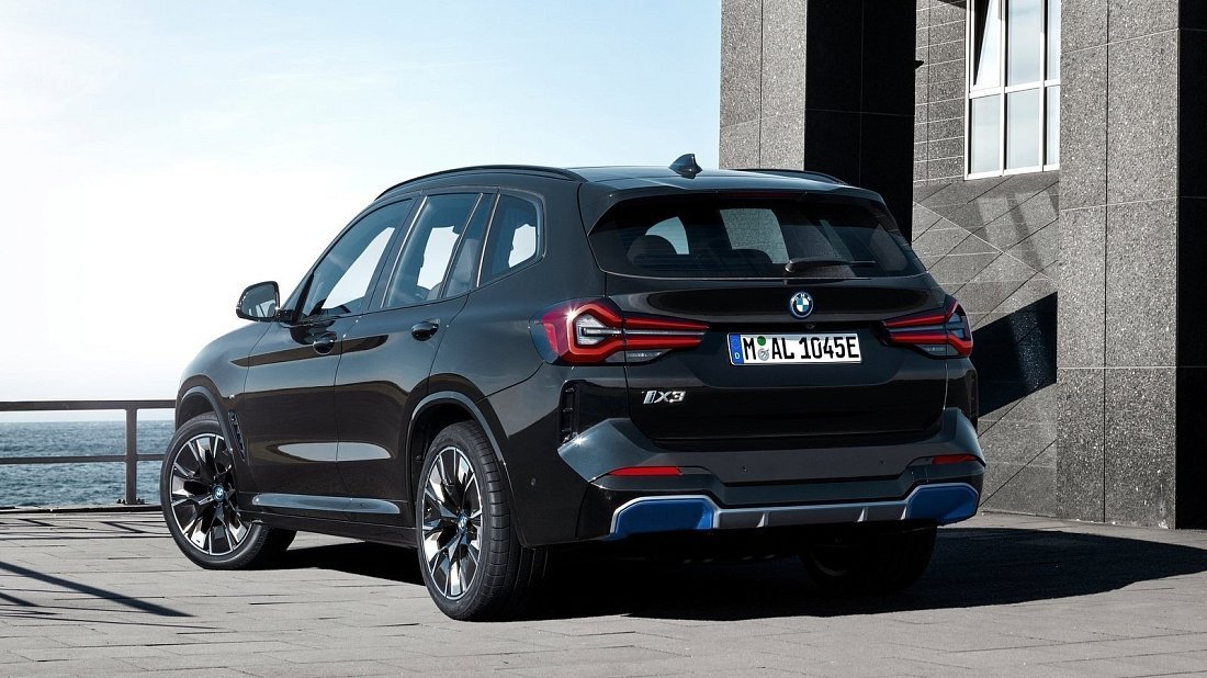 BMW iX3 Gen 2 (2021-…) rear quarter, three-quarter view, diagonal, exterior
