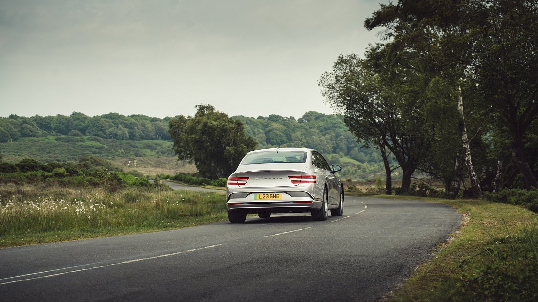 Genesis Electrified G80 AWD (2025-…) rear view photo, taillights, trunk, spoiler, badge, bumper, exterior
