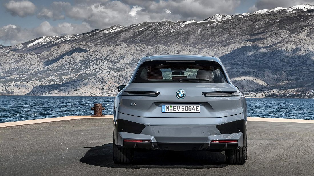 BMW iX xDrive50 (2021-2025) rear view, taillights, trunk, spoiler, badge, bumper, exterior