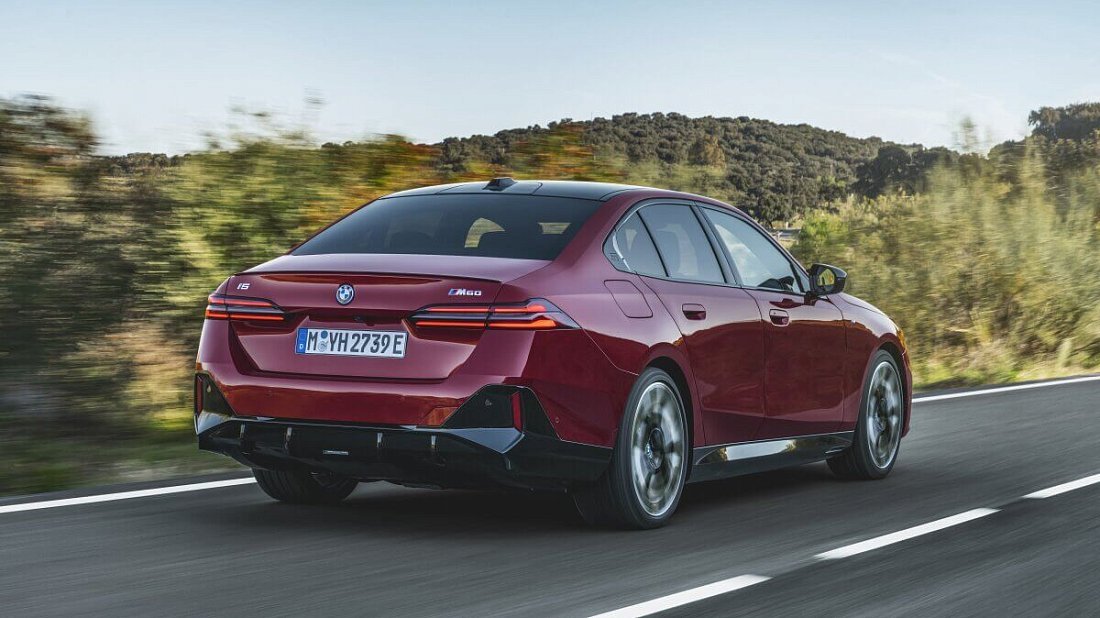 BMW i5 M60 xDrive (2025-…) rear quarter, three-quarter view, diagonal, exterior