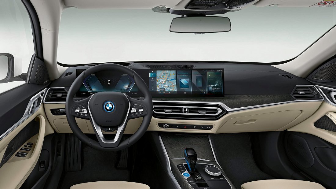 BMW i4 eDrive35 (2022-2024) interior photo, front seat, driver seat, dashboard, steering wheel, infotainment, cockpit