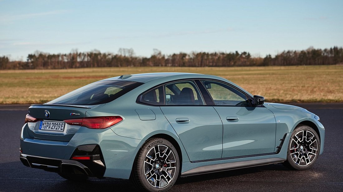 BMW i4 M50 (2024-…) rear quarter, three-quarter view, diagonal, exterior