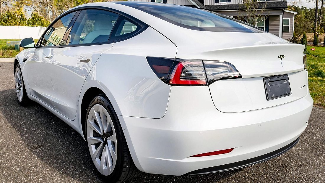 Tesla Model 3 Long Range AWD (2018-2023) rear quarter, three-quarter view, diagonal, exterior