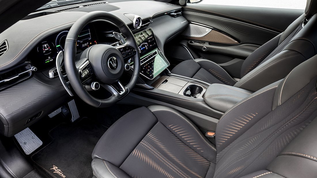 Maserati GranTurismo Folgore (2024-…) interior, front seat, driver seat, dashboard, steering wheel, infotainment, cockpit