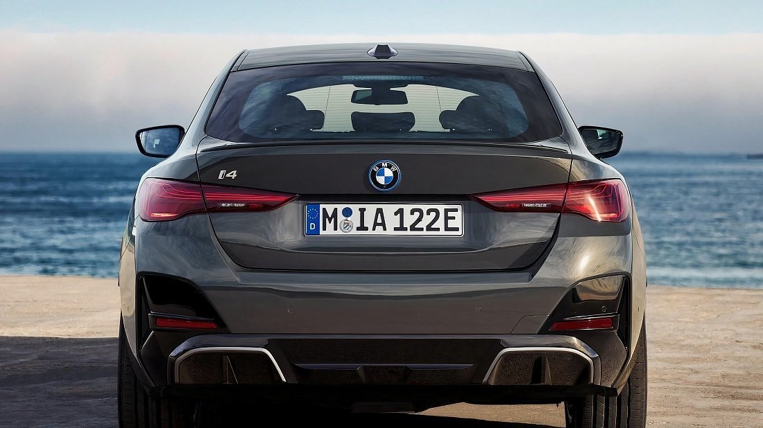 BMW i4 eDrive35 (2024-…) rear view, taillights, trunk, spoiler, badge, bumper, exterior