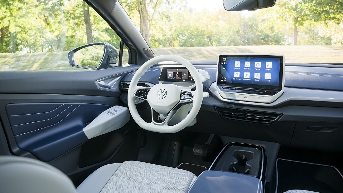 Volkswagen ID.4 Pro (2022-2024) interior, front seat, driver seat, dashboard, steering wheel, infotainment, cockpit
