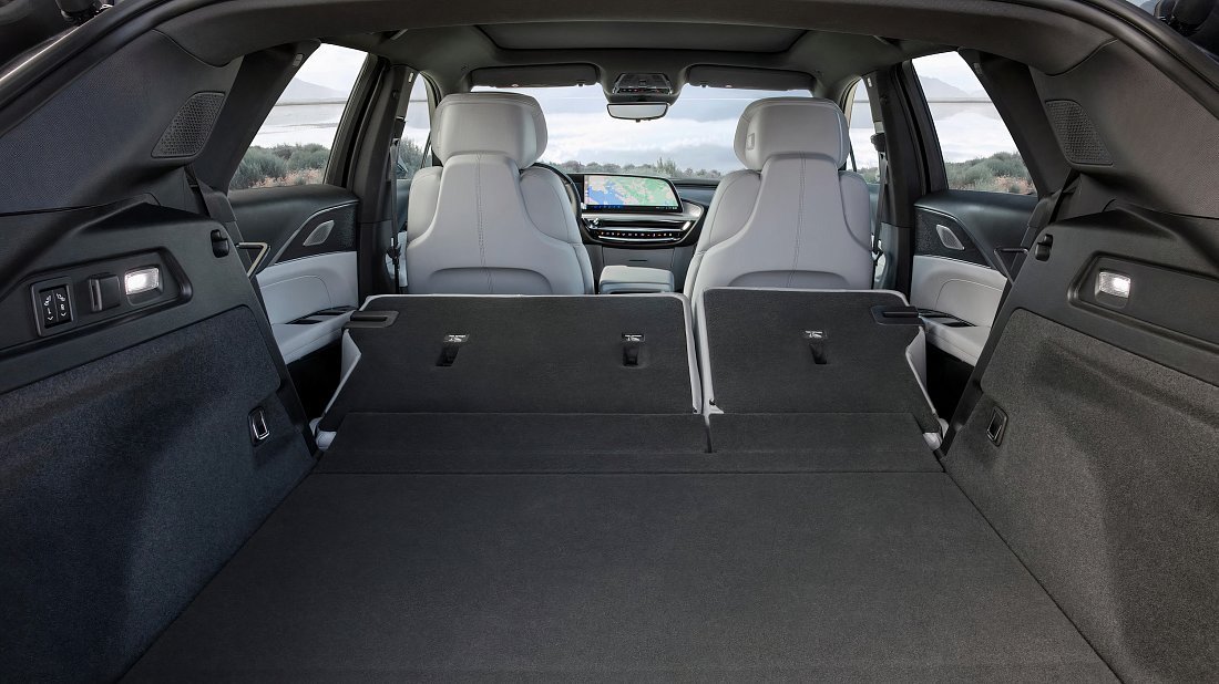 Cadillac Lyriq AWD (2022-…) folded trunk photo, boot, expanded, folded seats, maximum volume, max cargo, max capacity, max storage