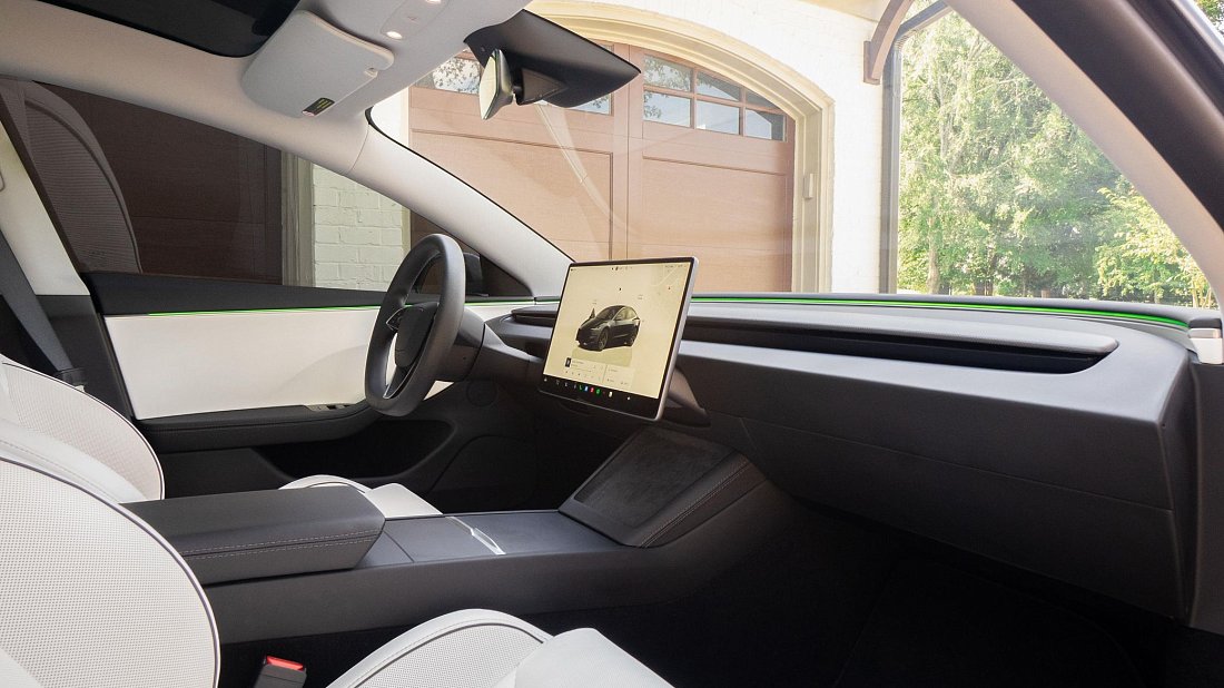 Tesla Model 3 Performance (2024-…) interior photo, front seat, driver seat, dashboard, steering wheel, infotainment, cockpit