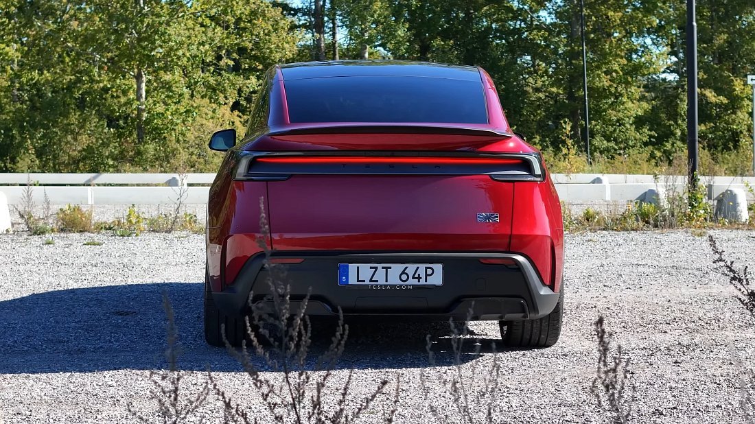 Tesla Model Y Performance (2025-...) rear view photo, taillights, trunk, spoiler, badge, bumper, exterior