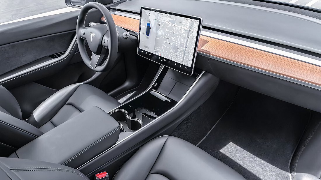 Tesla Model Y Long Range RWD (2024-2025) interior, front seat, driver seat, dashboard, steering wheel, infotainment, cockpit