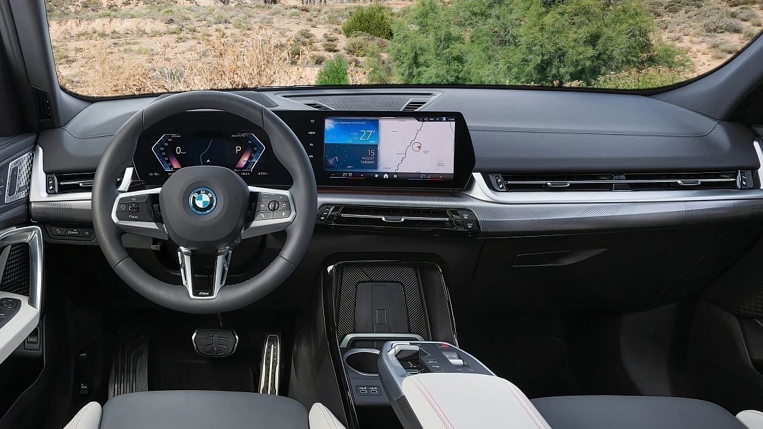 BMW iX2 eDrive20 (2024-…) interior, front seat, driver seat, dashboard, steering wheel, infotainment, cockpit