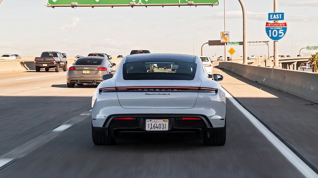 Porsche Taycan Turbo (2020-2024) rear view, taillights, trunk, spoiler, badge, bumper, exterior