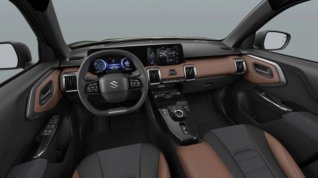 Suzuki e Vitara 61 kWh FWD (2025-…) interior photo, front seat, driver seat, dashboard, steering wheel, infotainment, cockpit
