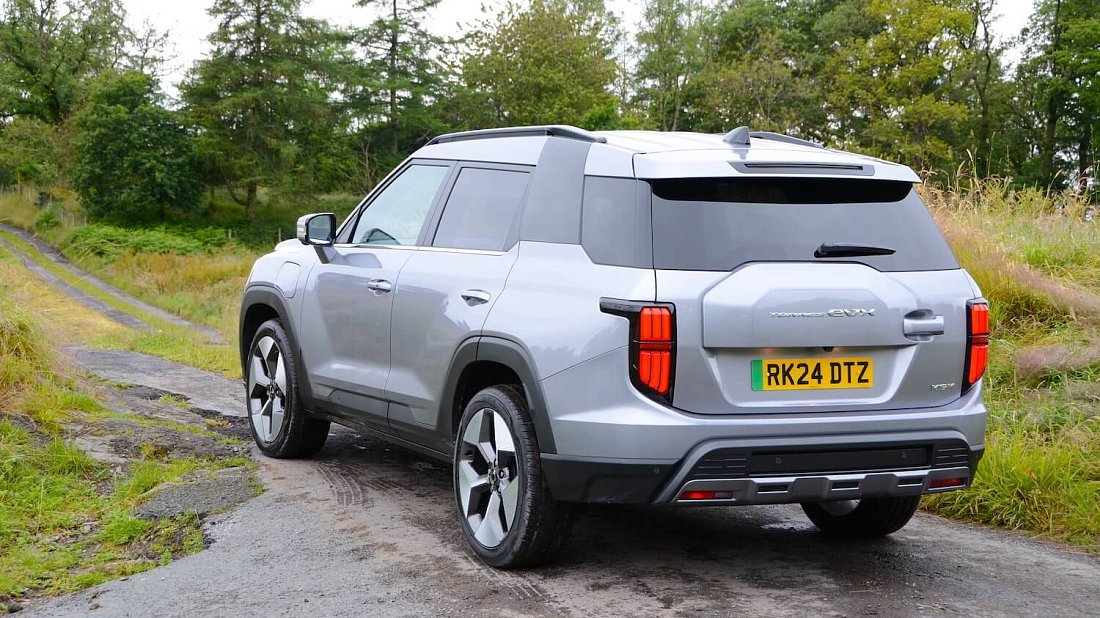 KGM Torres EVX (2024-...) rear quarter photo, three-quarter view, diagonal, exterior