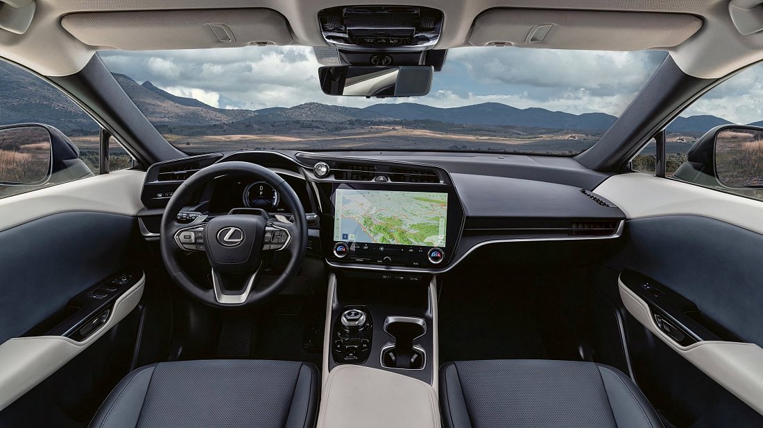Lexus RZ 500e (2025-…) interior photo, front seat, driver seat, dashboard, steering wheel, infotainment, cockpit