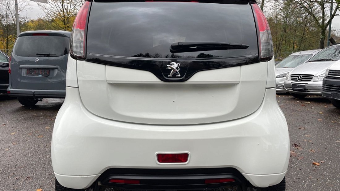 Peugeot iOn Gen 1 (2010-2020) rear view photo, taillights, trunk, spoiler, badge, bumper, exterior