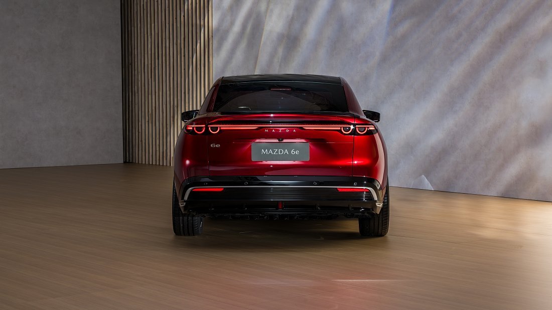 Mazda 6e Long Range (2025-…) rear view, taillights, trunk, spoiler, badge, bumper, exterior