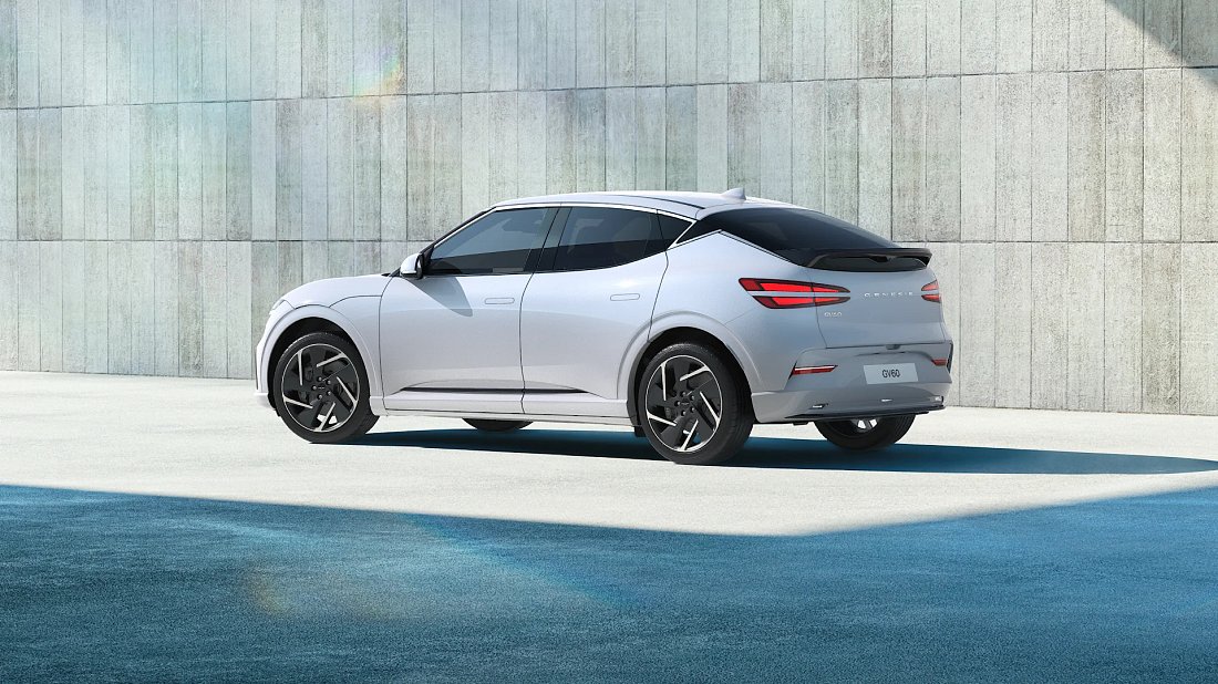 Genesis GV60 Performance AWD (2025-…) rear quarter photo, three-quarter view, diagonal, exterior