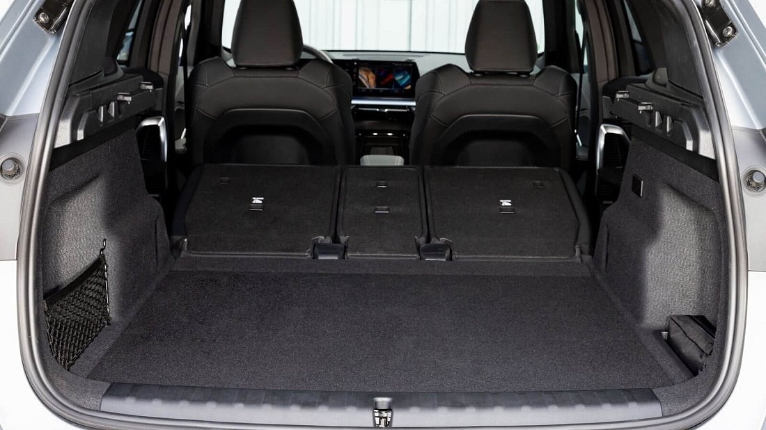 BMW iX1 xDrive30 (2022-…) folded trunk photo, boot, expanded, folded seats, maximum volume, max cargo, max capacity, max storage