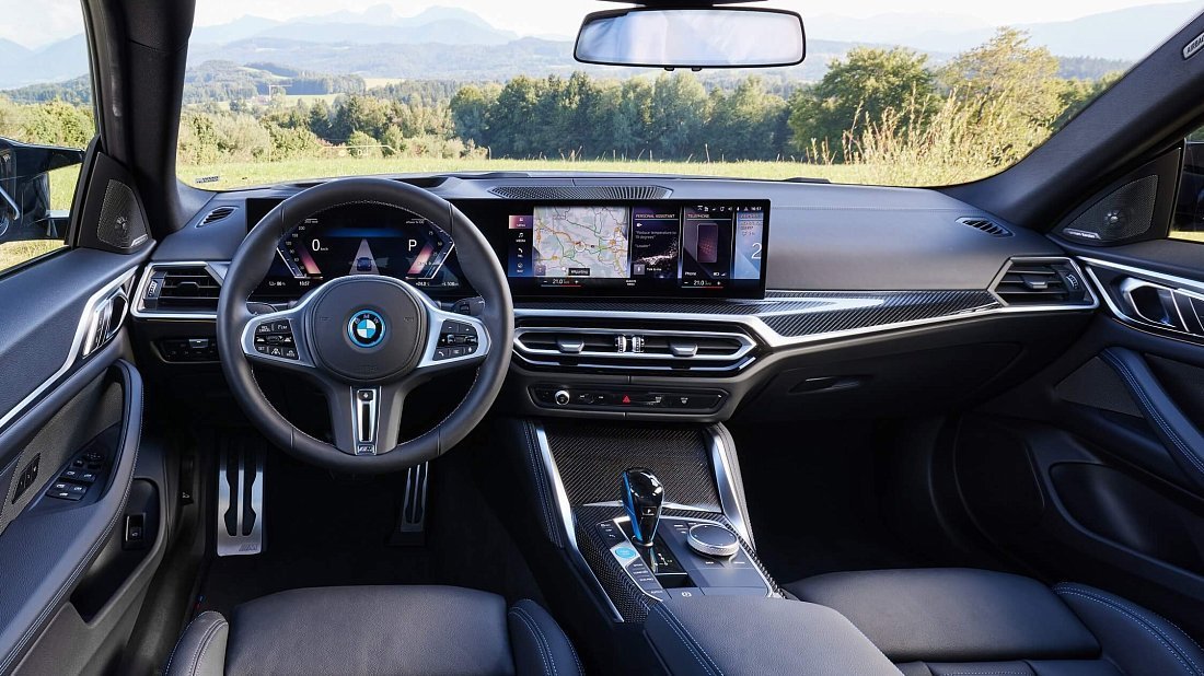 BMW i4 M50 (2021-2024) interior, front seat, driver seat, dashboard, steering wheel, infotainment, cockpit