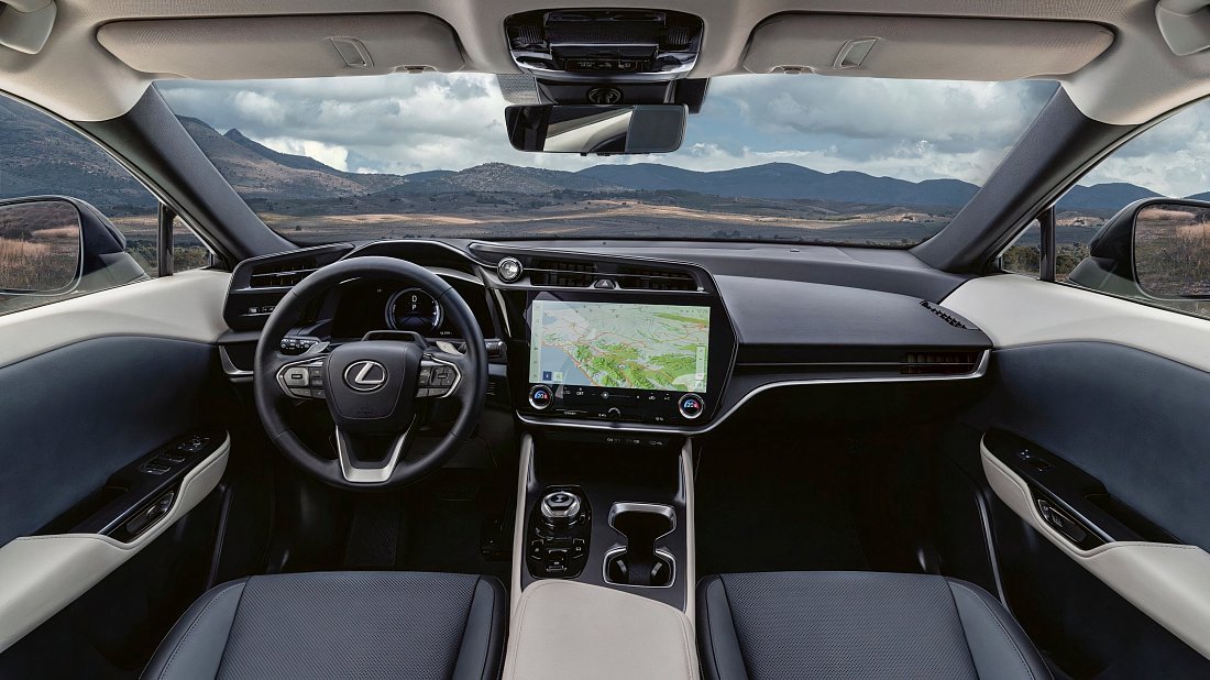Lexus RZ 300e (2024-…) interior photo, front seat, driver seat, dashboard, steering wheel, infotainment, cockpit