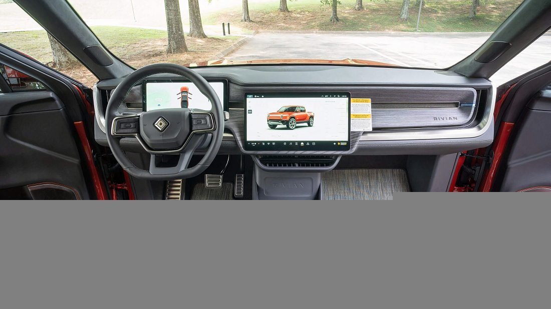Rivian R1T Performance Dual-Motor AWD Max (2023-2024) interior photo, front seat, driver seat, dashboard, steering wheel, infotainment, cockpit