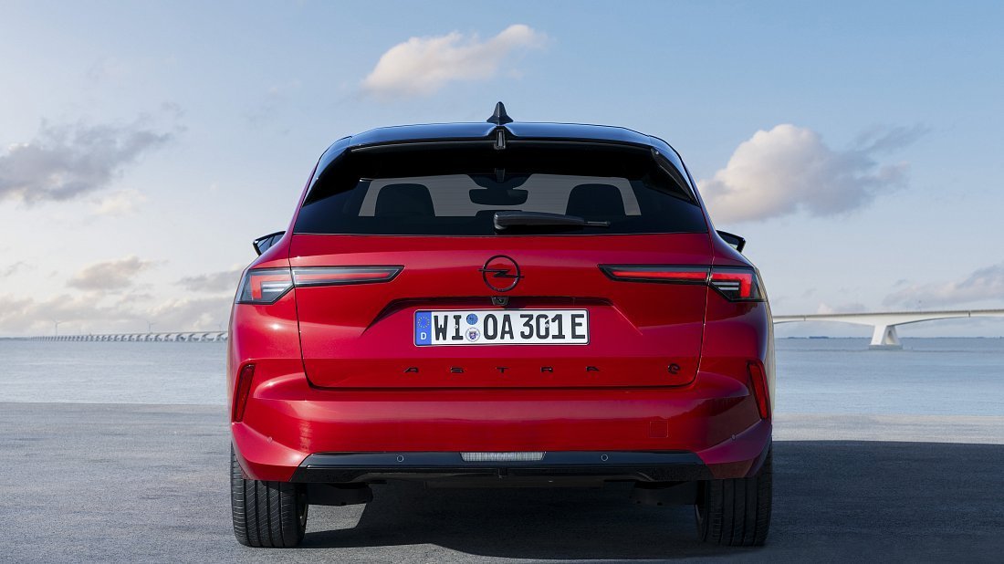 Opel Astra Electric Sports Tourer (2023-…) rear view, taillights, trunk, spoiler, badge, bumper, exterior
