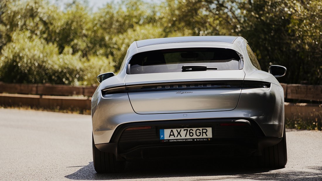 Porsche Taycan RWD Sport Turismo (2022-2024) rear view, taillights, trunk, spoiler, badge, bumper, exterior