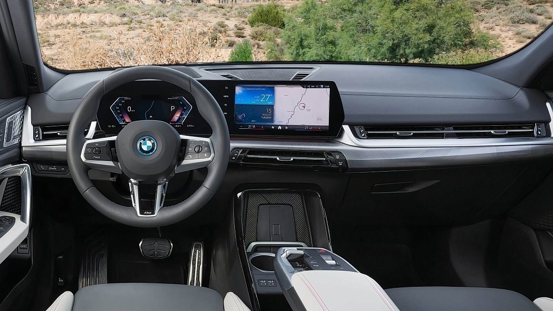BMW iX2 xDrive30 (2023-…) interior, front seat, driver seat, dashboard, steering wheel, infotainment, cockpit