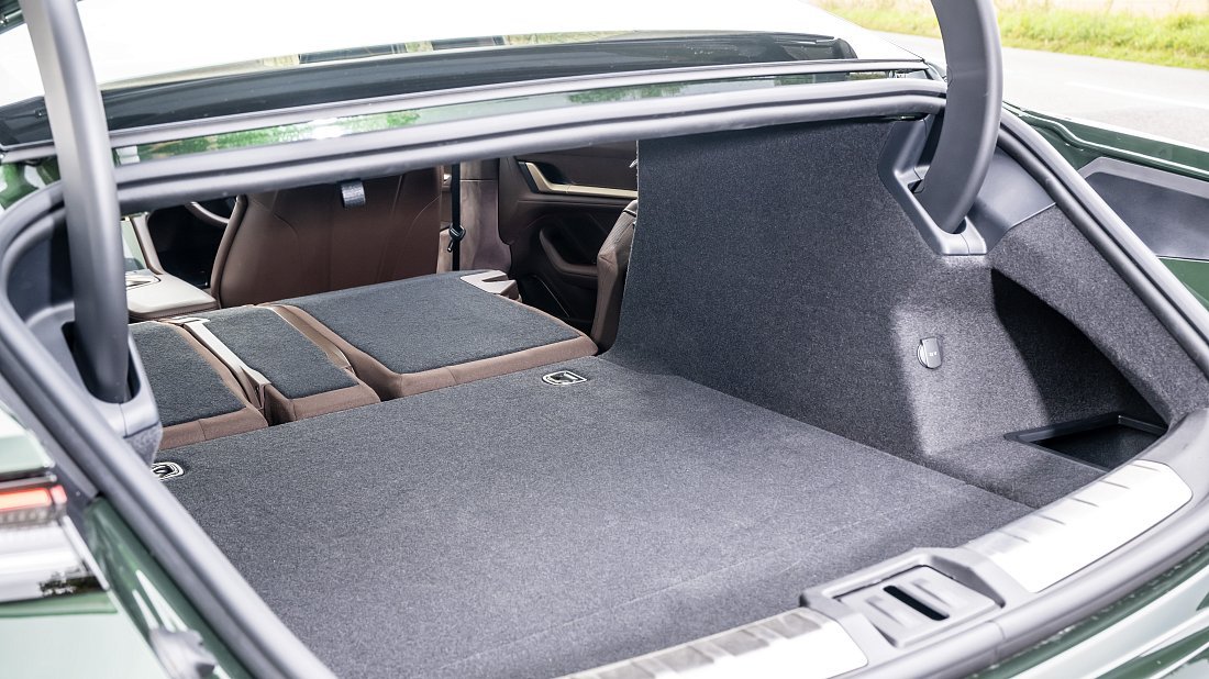 Porsche Taycan Turbo S (2024-…) folded trunk photo, boot, expanded, folded seats, maximum volume, max cargo, max capacity, max storage