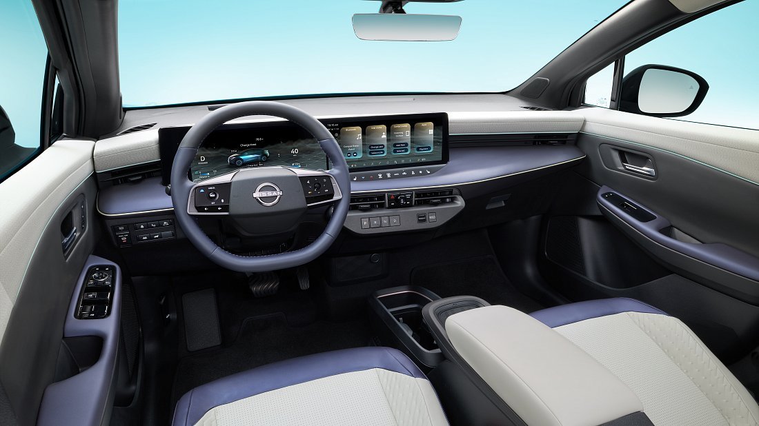 Nissan Leaf 52 kWh (2025-…) interior, front seat, driver seat, dashboard, steering wheel, infotainment, cockpit