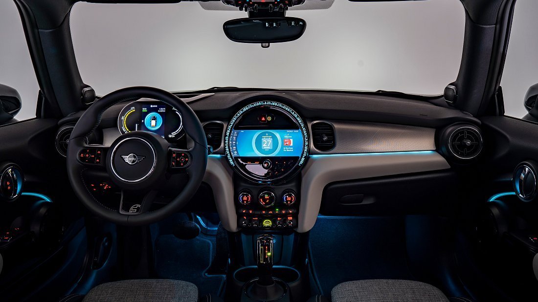 Mini Cooper SE (2021-2024) interior photo, front seat, driver seat, dashboard, steering wheel, infotainment, cockpit