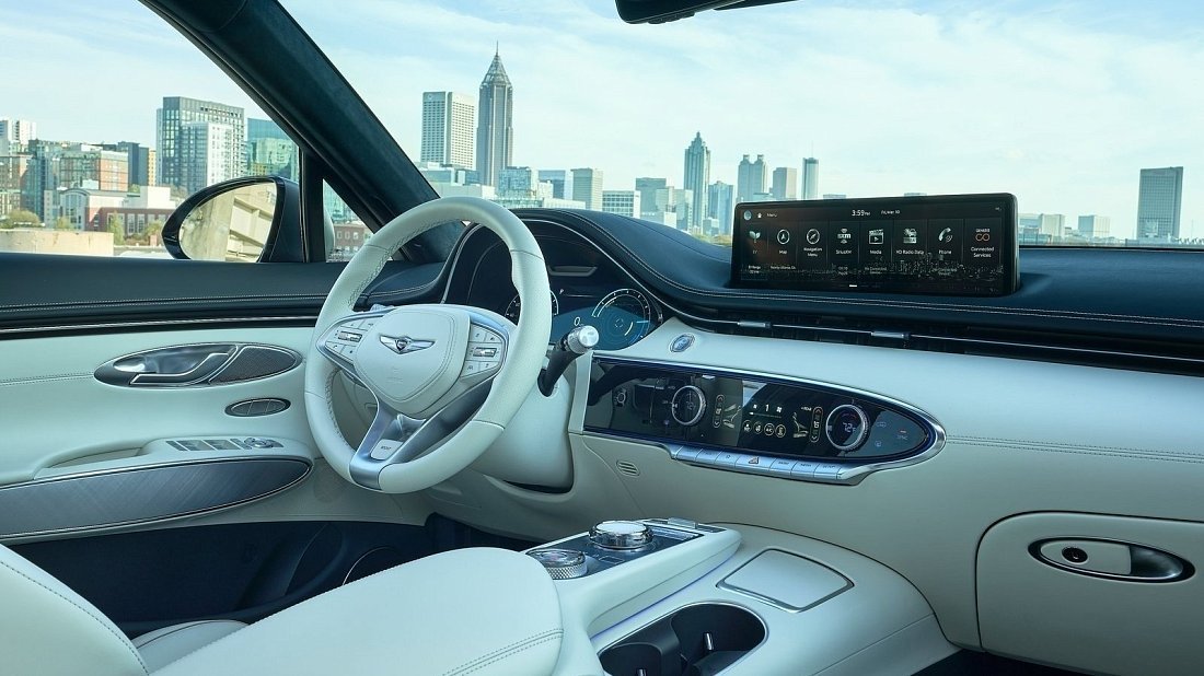 Genesis Electrified GV70 AWD (2022-…) interior photo, front seat, driver seat, dashboard, steering wheel, infotainment, cockpit