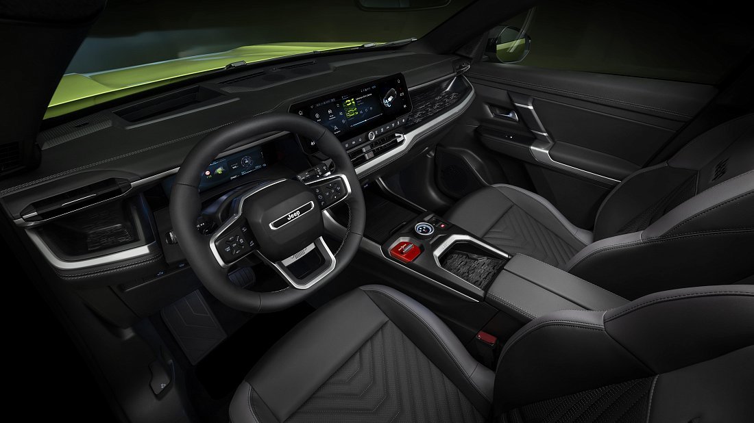 Jeep Compass Electric (2025-…) interior photo, front seat, driver seat, dashboard, steering wheel, infotainment, cockpit