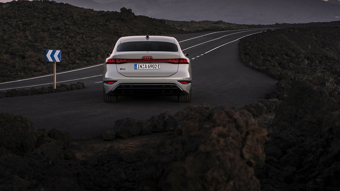 Audi A6 Sportback e-tron quattro (2024-…) rear view, taillights, trunk, spoiler, badge, bumper, exterior